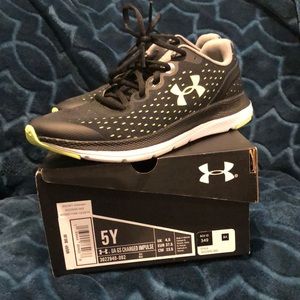 Under Armour black and lime green sneakers